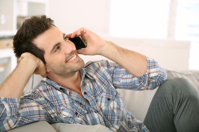 Feeling excited, a man talks to a woman for a long time on the phone